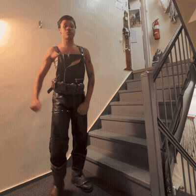 Man On Stairs With Fire Extinguisher GIF