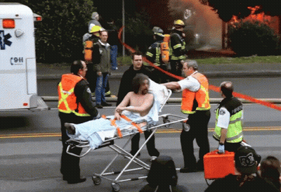 Man On Stretcher Loaded Into Ambulance 9H GIF