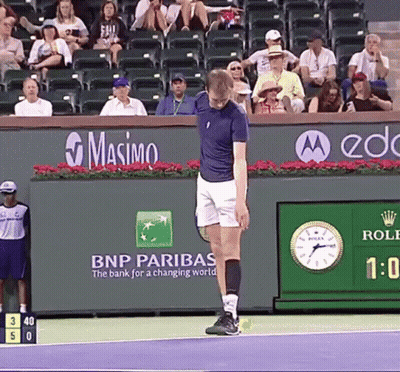 Man On Tennis Court In Front Of BNP Paribas Ad GIF