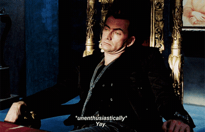 Man On Throne Says Unenthusiastically GIF