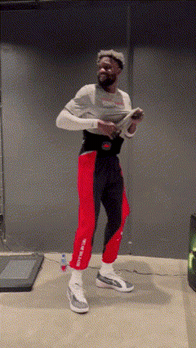 Man On Treadmill Holding Wii Controller GIF