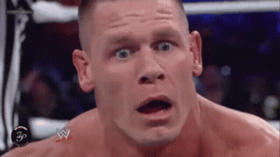 Man Open Mouth Wrestling Logo On Chest GIF