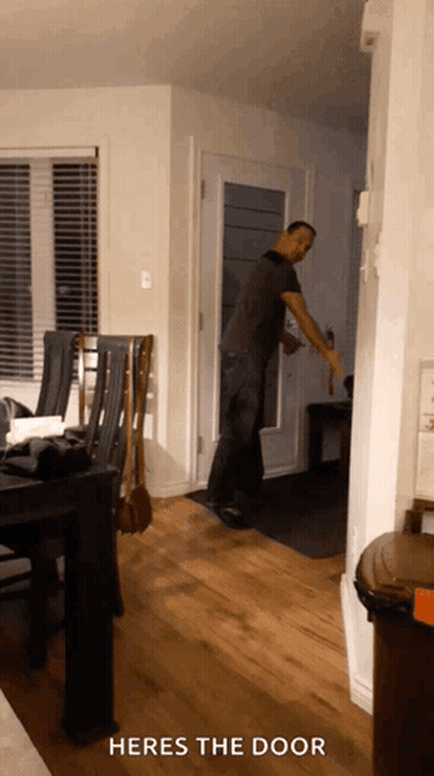 Man Opening Door Saying Heres The Door GIF