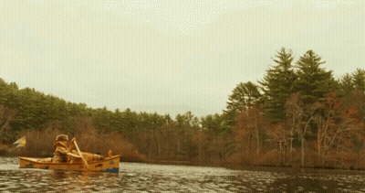 Man Paddling Yellow Canoe GIF