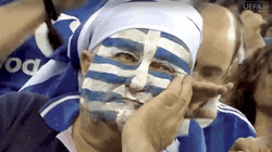 Man Painted With Greece Flag On His Face GIF