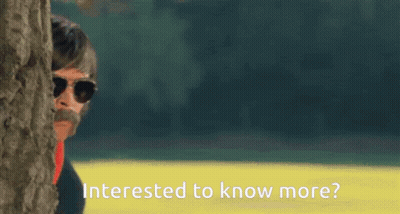 Man Peeking Behind Tree Interested To Know More GIF