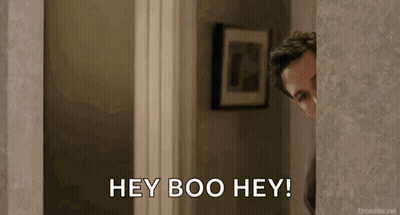 Man Peeking From Behind Wall Saying Hey Boo Hey GIF