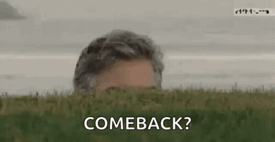 Man Peeking From Field Saying Comeback GIF