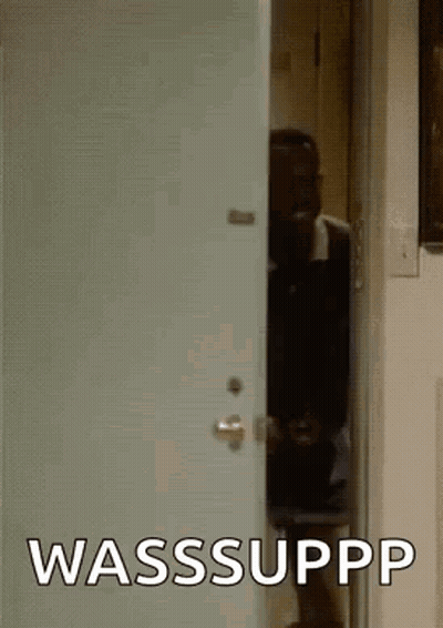 Man Peeking Out Of Door With Wasssuppp GIF