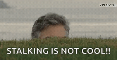 Man Peeking Out Of Grass Stalking Is Not Cool GIF