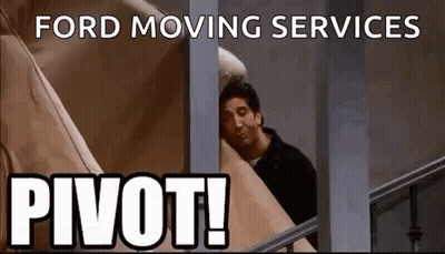 Man Peeking Out Window Ford Moving Services Pivot GIF