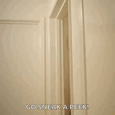 Man Peeking Through Door Go Sneak A Peek GIF