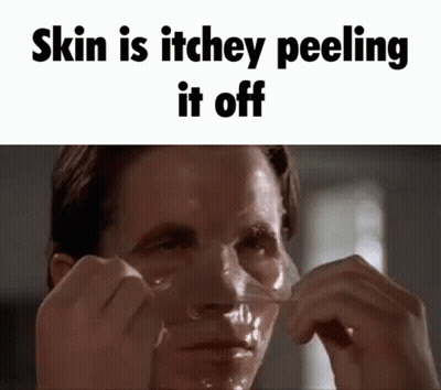 Man Peeling Tape Off Face