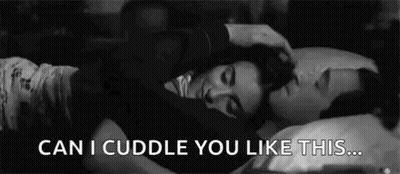 Man Petting Woman's Hair In Bed GIF
