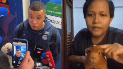 Man Photographing Woman Holding Guinea Pig GIF