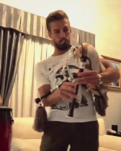 Man Playing Bagpipe GIF