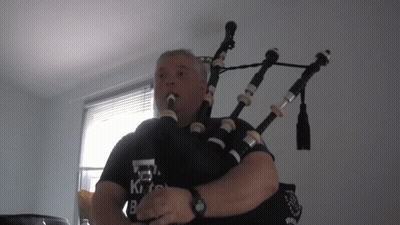 Man Playing Bagpipe Wearing Kilts Shirt GIF