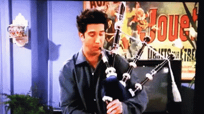 Man Playing Bagpipe With Joue Poster GIF