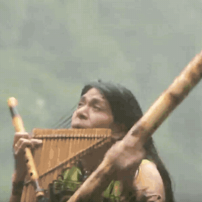 Man Playing Bamboo Flute GIF