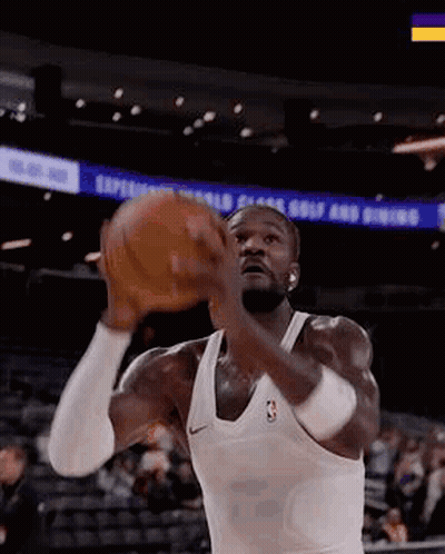 Man Playing Basketball In Stadium GIF