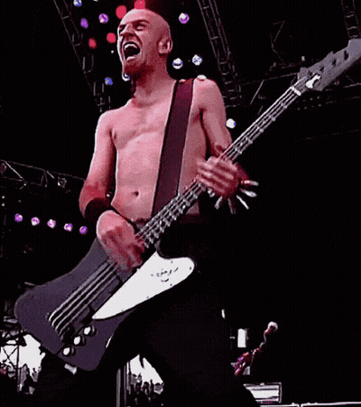 Man Playing Bass Guitar On Stage GIF
