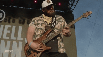 Man Playing Bass Guitar With Rdtime Strap GIF