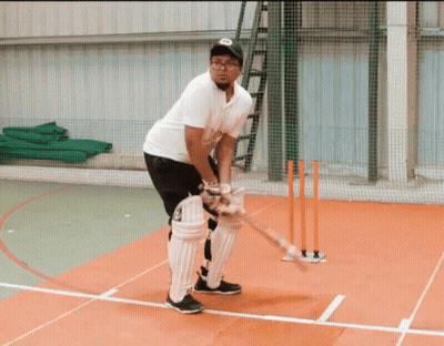 Man Playing Cricket With Bat GIF