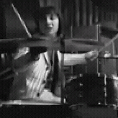 Man Playing Drum Set In Black And White GIF