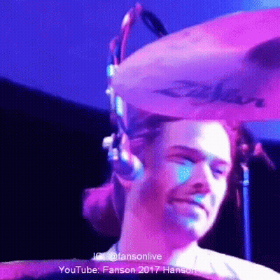 Man Playing Drum Set With Zildjian Cymbal On Head GIF