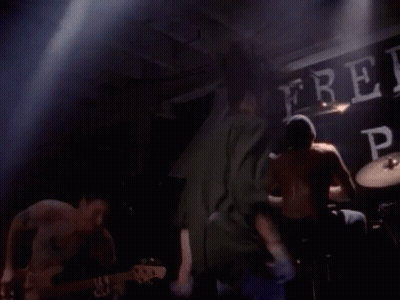 Man Playing Drums At Free Press Sign GIF