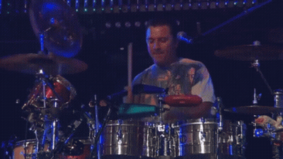 Man Playing Drums In Snoop Dogg Shirt GIF