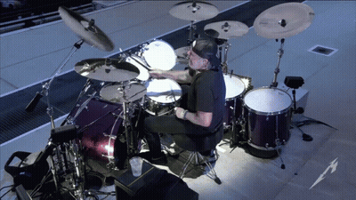 Man Playing Drums With Metallica Logo GIF