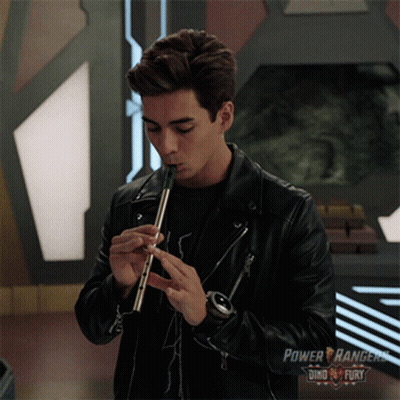 Man Playing Flute Power Rangers Advertisement GIF