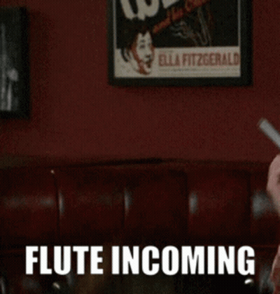 Man Playing Flute With Flute Incoming GIF
