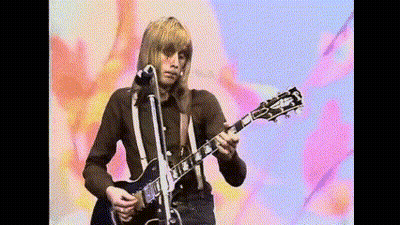 Man Playing Gibson Guitar In Front Of Microphone GIF