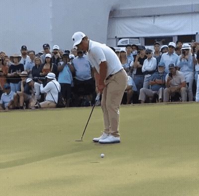 Man Playing Golf In Front Of Crowd GIF