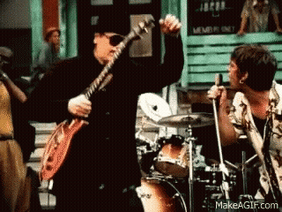 Man Playing Guitar And Man Singing At Drum Set GIF