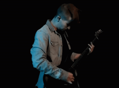 Man Playing Guitar And Singing Into Microphone GIF