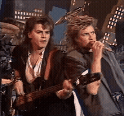 Man Playing Guitar And Singing Into Microphone With Drummer GIF
