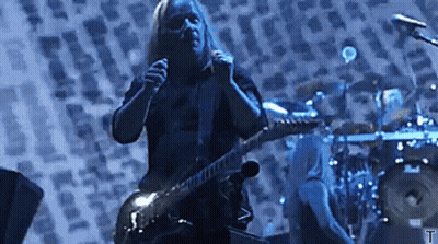 Man Playing Guitar And Singing Into Microphone With Drummer GIF