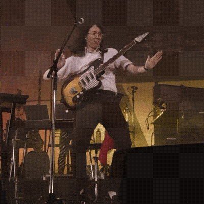 Man Playing Guitar And Singing On Stage GIF