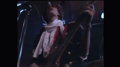 Man Playing Guitar And Singing On Stage GIF