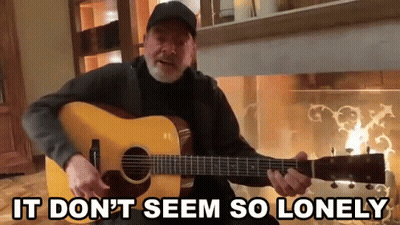 Man Playing Guitar By Fireplace It Don't Seem So Lonely GIF
