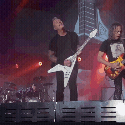 Man Playing Guitar By Tama Drum Set GIF