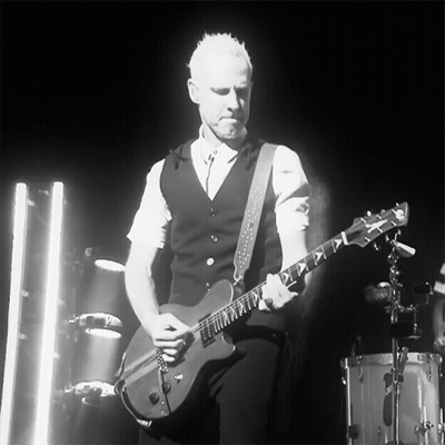 Man Playing Guitar In Dark Room GIF