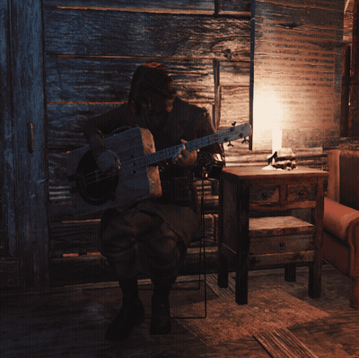 Man Playing Guitar In Dark Room With Lamp GIF