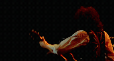 Man Playing Guitar In Front Of Crowd GIF