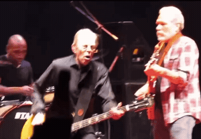 Man Playing Guitar In Front Of Drum Saying Tim GIF
