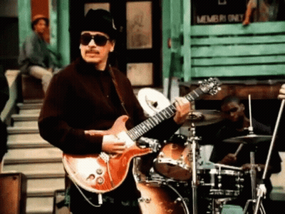 Man Playing Guitar In Sunglasses And Hat By Drum Set GIF