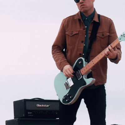 Man Playing Guitar Next To Blackstar Amp GIF